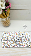 Load image into Gallery viewer, Daisies and Pencils Front Knot Headband