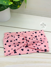 Load image into Gallery viewer, Black Hearts on Pink Front Knot Headband