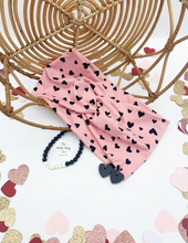 Load image into Gallery viewer, Black Hearts on Pink Front Knot Headband