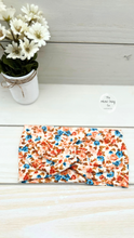 Load image into Gallery viewer, Ribbed Retro Flowers Blue and Orange on Ivory Front Knot Headband
