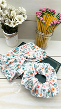 Load image into Gallery viewer, Books Pencils Flowers Scrunchie
