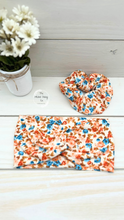 Load image into Gallery viewer, Ribbed Retro Flowers Blue and Orange on Ivory Front Knot Headband
