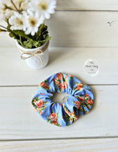 Load image into Gallery viewer, Cornflower Blue Orange Floral Scrunchie
