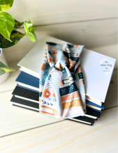 Load image into Gallery viewer, Ribbed Vintage Books and Flowers Front Knot Headband
